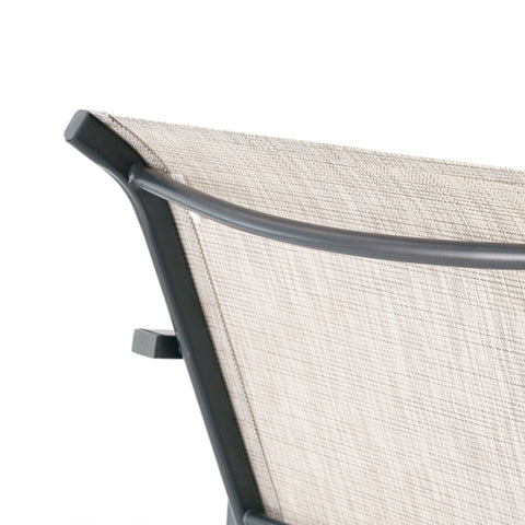 Outdoor patio bar stool armrest detail view