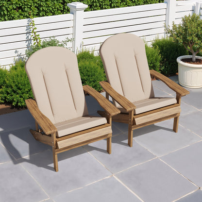 Two Adirondack chairs with deep seat outdoor cushions in a garden setting