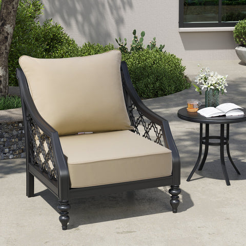 Crestlive Products outdoor Adirondack chair with deep seat cushion next to a small round table in a garden