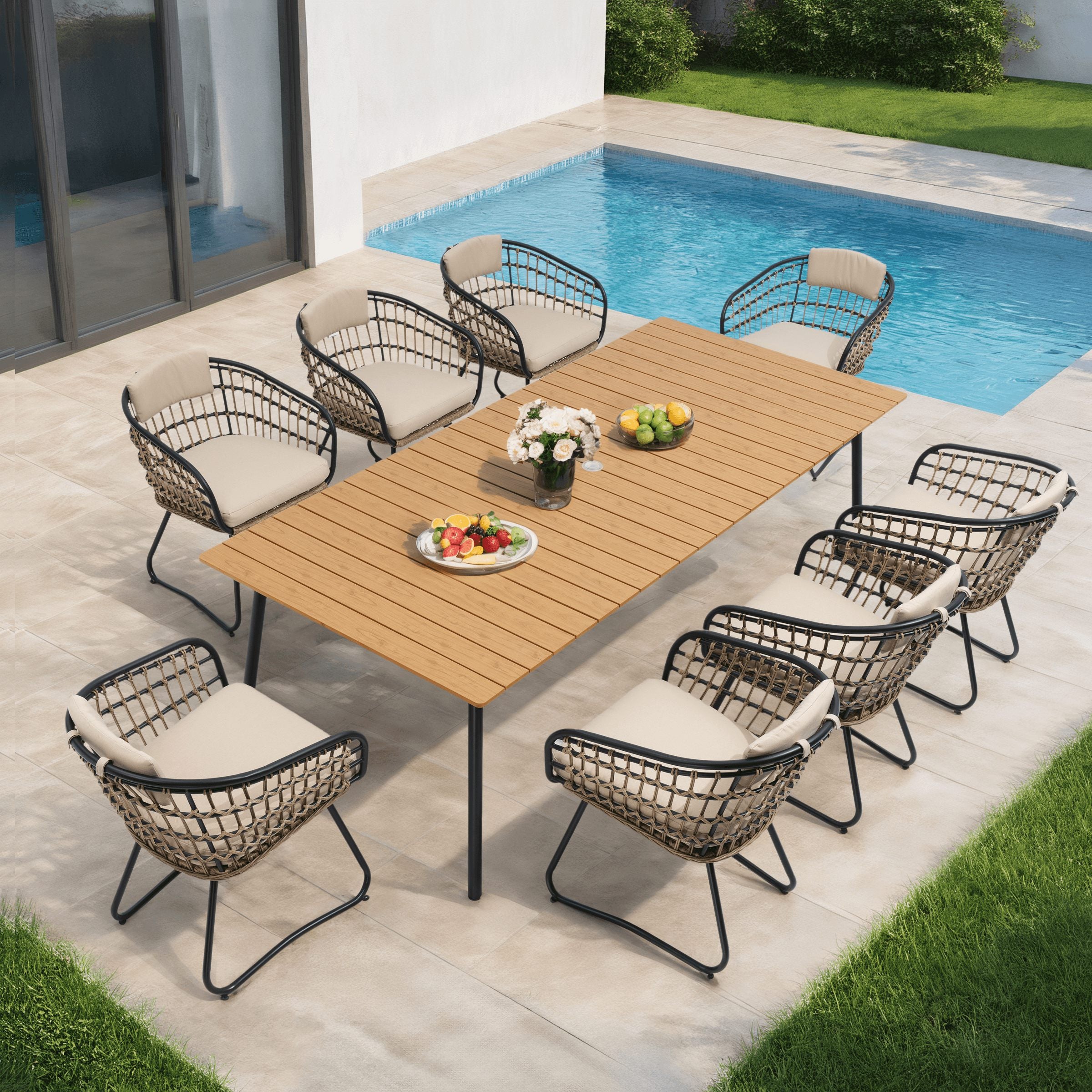 PE rattan outdoor chairs with cushions arranged around a long table by a poolside