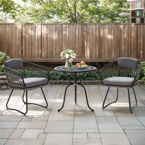 Crestlive Products PE rattan outdoor chairs with cushions around a round table in a backyard setting