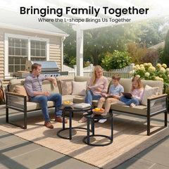 Family relaxing on modular PE wicker outdoor sectional sofa set on backyard patio.