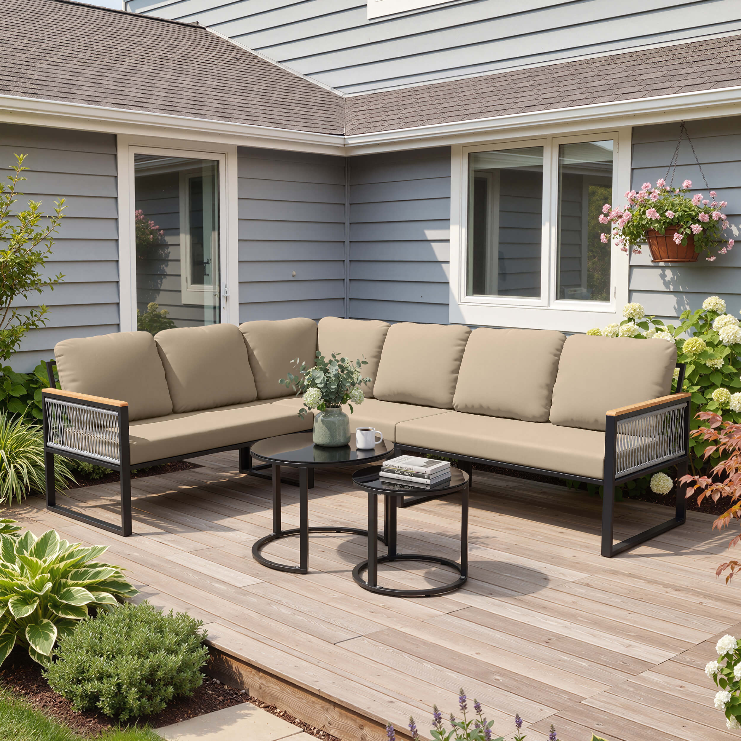 Modular PE wicker outdoor sectional sofa set with khaki cushions on backyard patio deck.