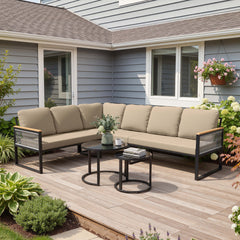 Modular PE wicker outdoor sectional sofa set with khaki cushions on backyard patio deck.