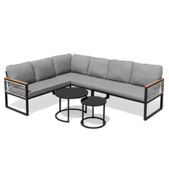 Modular PE wicker outdoor sectional sofa set with gray cushions and nesting coffee tables.
