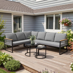 Modular PE wicker outdoor sectional sofa set with gray cushions on backyard patio deck.