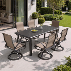 7-piece patio dining set with aluminum expandable table and 6 Sunbrella swivel rockers on patio.