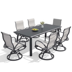 7-piece patio dining set with aluminum expandable table and 6 Sunbrella swivel rockers.