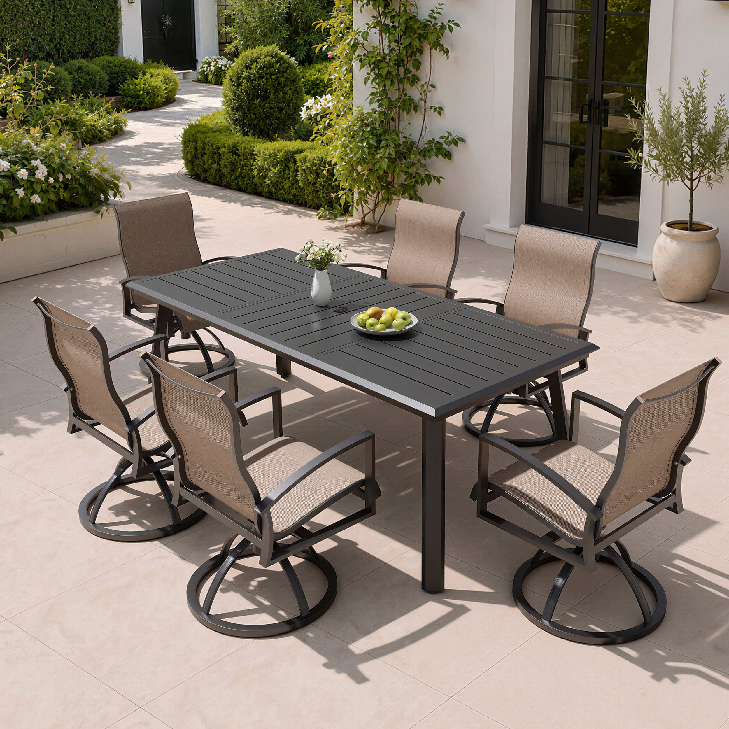 7-piece patio dining set with aluminum expandable table and 6 Sunbrella swivel rockers on patio.