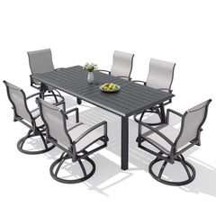 7-piece patio dining set with aluminum expandable table and 6 Sunbrella swivel rockers.