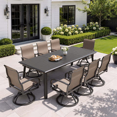 9-piece patio dining set with aluminum expandable table and 8 swivel Sunbrella chairs on patio.