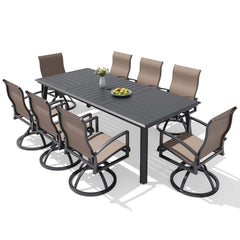 9-piece patio dining set with aluminum expandable table and 8 Sunbrella swivel rockers.
