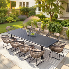 11-piece patio dining set with aluminum expandable table and 10 wicker chairs on patio.