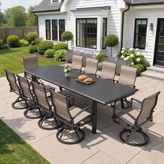 11-piece patio dining set with aluminum expandable table and 10 Sunbrella swivel rockers on patio.
