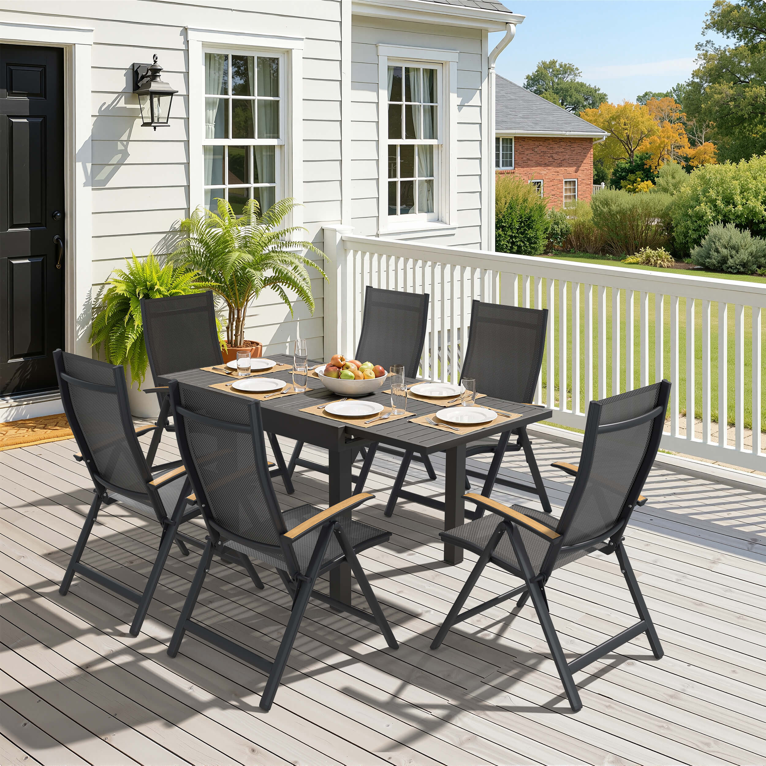 7-piece expandable patio dining set with aluminum slatted table and 6 folding Textilene chairs on deck.
