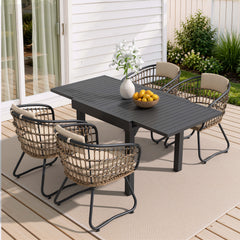5-piece expandable patio dining set with black aluminum table and 4 PE rattan chairs on deck.