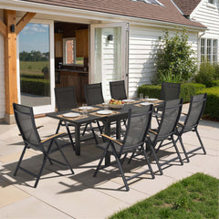 9-piece expandable patio dining set with aluminum table and 8 folding Textilene chairs on patio.