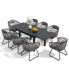 9-piece expandable patio dining set with black aluminum table and 8 grey PE rattan chairs.