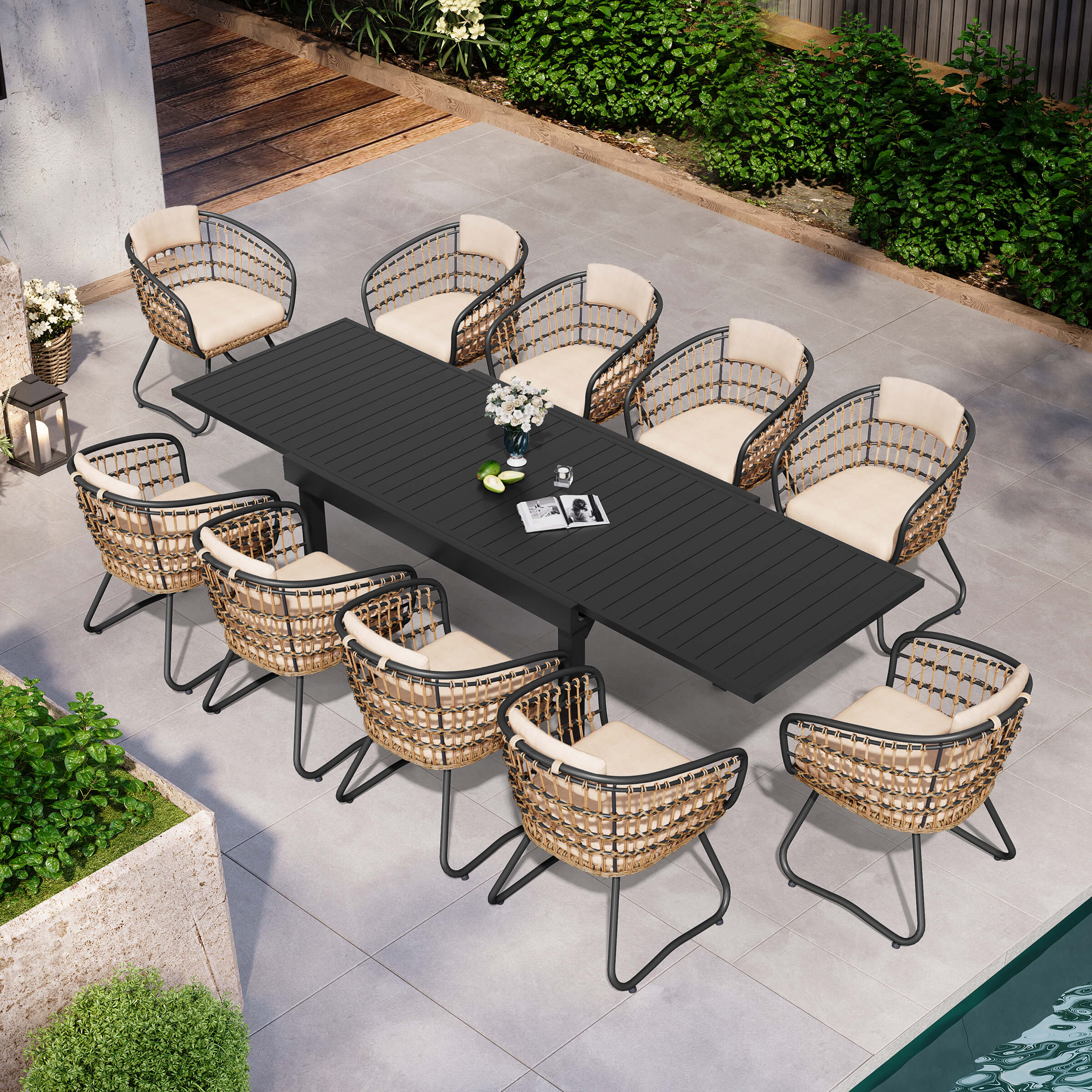11-piece expandable patio dining set with black aluminum table and 10 PE rattan chairs poolside.