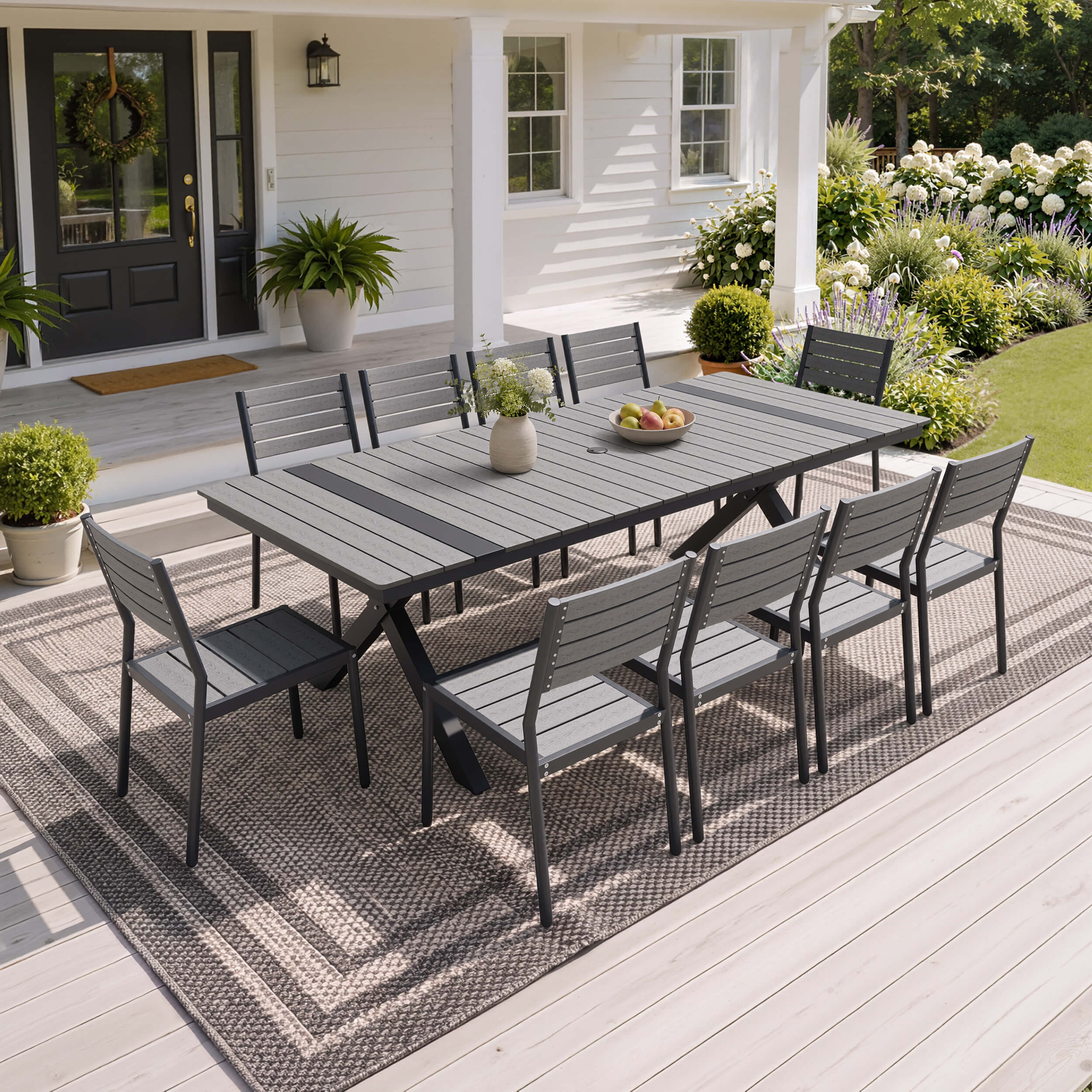 10-person dark grey patio dining set with WPC slatted umbrella table and armless chairs on deck.