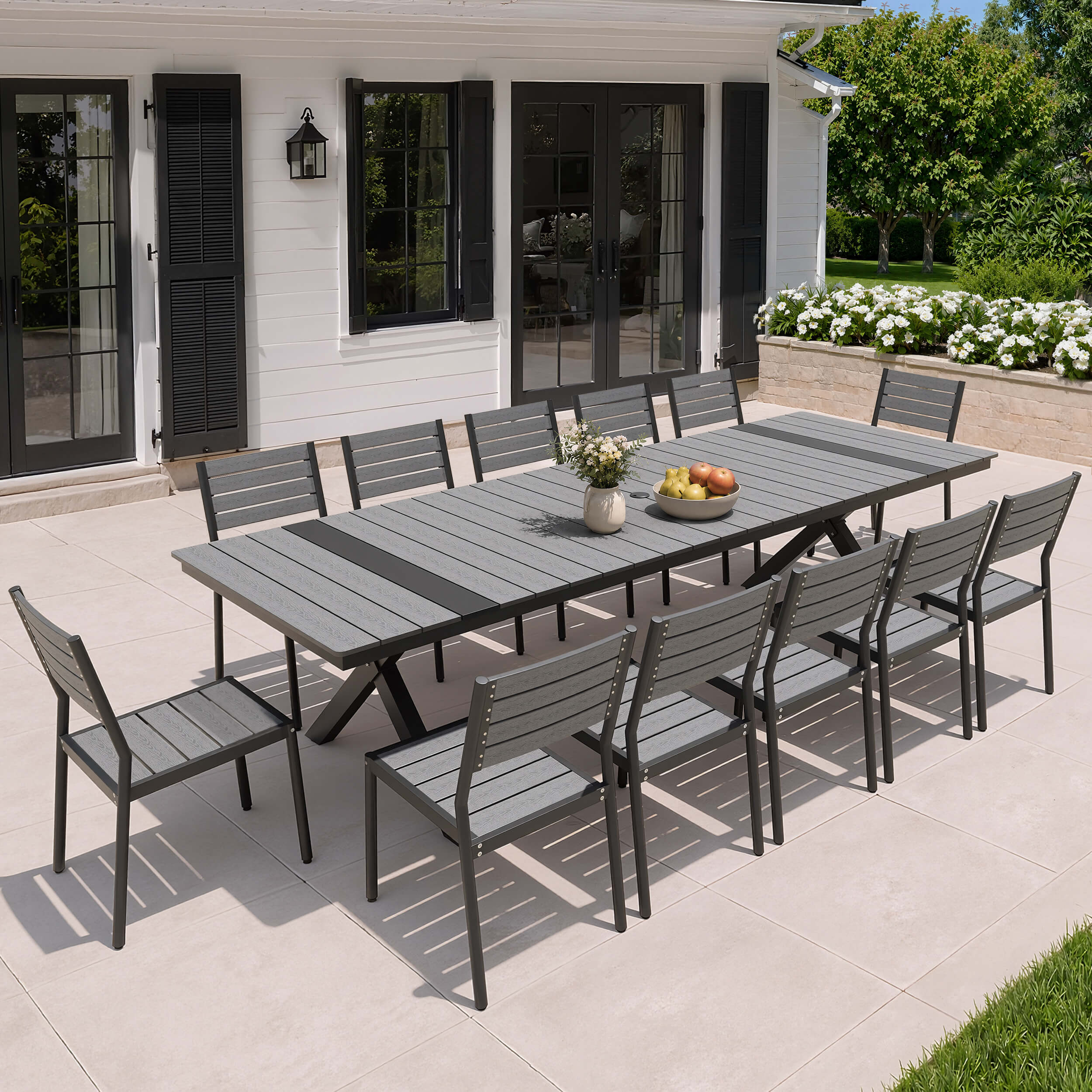 12-person dark grey patio dining set with WPC slatted umbrella table and armless chairs on deck.